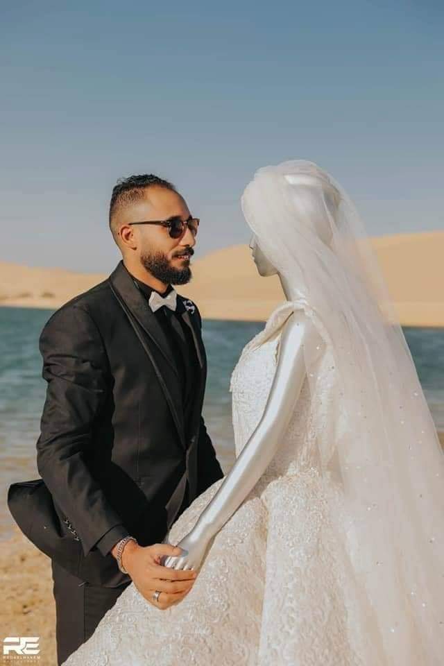 Photo of عريس مصري يستبدل زوجته المنتقبة بمانيكان في جلسة تصوير فرحه (صور)