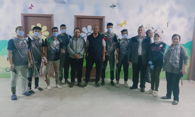 Photo of متطوعين باسوس بالقناطر الخيرية يقومون بحملة تعقيم وتوعية لأهالي القرية