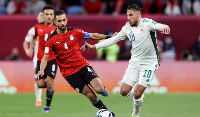 أعلن الاتحاد الدولي لكرة القدم "فيفا"، عن طاقم التحكيم لمباراة مصر الأردن ضمن مواجهات ربع نهائي بطولة كأس العرب . يدير المباراة الهندوراسي هيكتور سعيد مارتينز ، ويعاونه كل من لوبيز والتر ،وراميريز كريستيان ،والمكسيكي فرناندو هيرنانديز جوميز حكم الرابع، و المكسيكي جوريرو راميريز فرناندو حكم قيدي و والأمريكي ماروفو جاير مساعد . تنطلق المباراة غدا في تمام الساعة الخامسة ، بأرض استاد الجنوب . ويأتي التشكيل المتوقع علي النحو التالي : حراسة المرمى: محمد الشناوي . خط الدفاع: أحمد فتوح – أحمد ياسين – محمود الونش – عمر كمال عبد الواحد. الوسط : حمدي فتحي – عمرو السولية ومحمد مجدي أفشة . والهجوم : حسين فيصل ، محمد شريف - مروان حمدي .